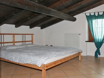 Ferienwohnung Comer See - Schlafzimmer mit Doppelbett